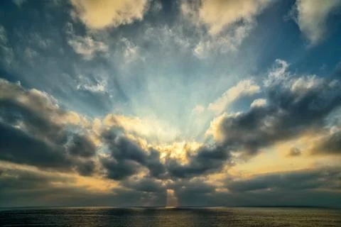 Sunset over the sea Stock Photos