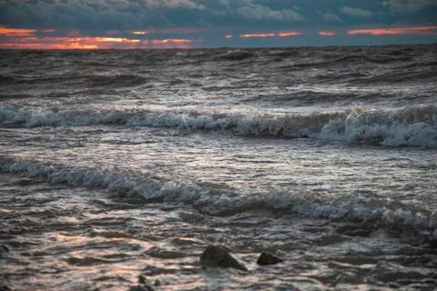 Sunset over the sea Stock Photos