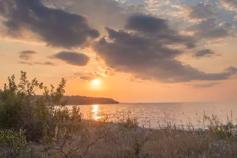 Sunset over the sea Stock Photos