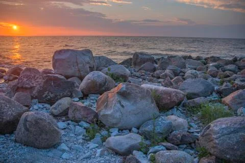 Sunset over the sea Stock Photos