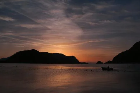 Sunset over the sea Stock Photos