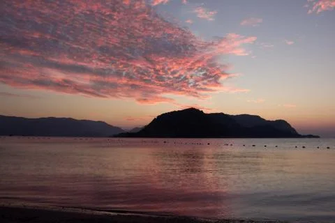 Sunset over the sea Stock Photos