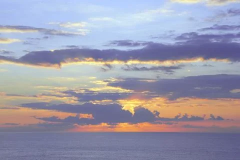 Sunset over the sea Stock Photos