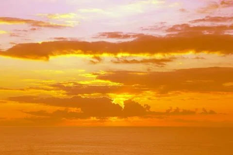 Sunset over the sea Stock Photos