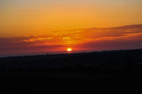 Sunset over the sea Stock Photos