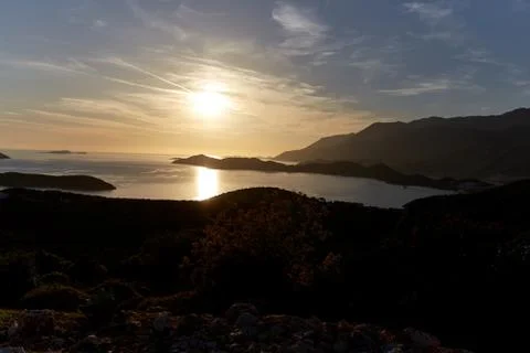 Sunset over the sea Stock Photos
