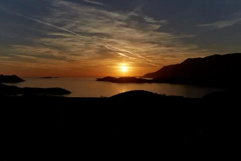 Sunset over the sea Stock Photos