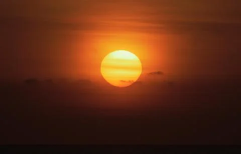 Sunset over the sea. Stock Photos
