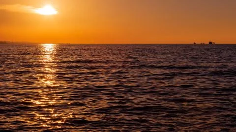 The sunset over the sea Stock Photos