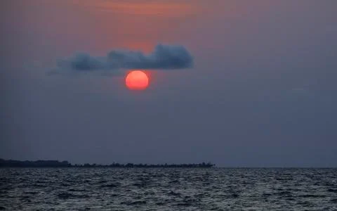 Sunset over the sea Stock Photos