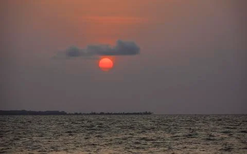 Sunset over the sea Stock Photos