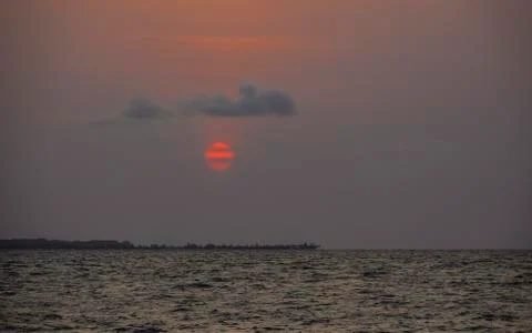 Sunset over the sea Stock Photos