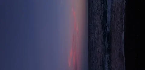 Sunset over the sea Stock Photos