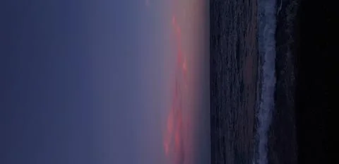 Sunset over the sea Stock Photos
