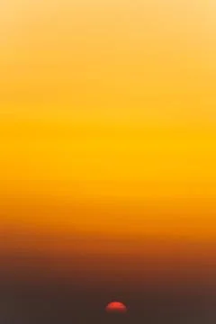 Sunset over the sea Stock Photos