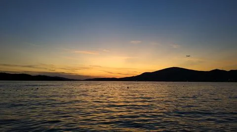 Sunset over sea Stock Photos