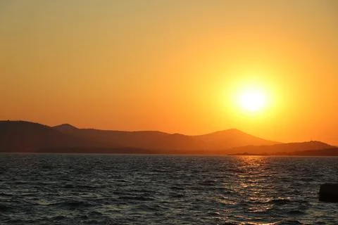 Sunset over sea Stock Photos