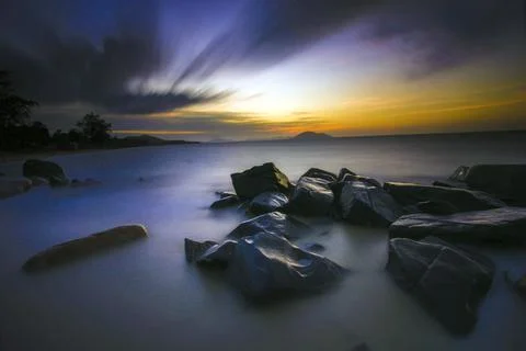 Sunset over the sea Stock Photos