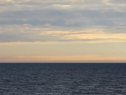 Sunset over sea Stock Photos