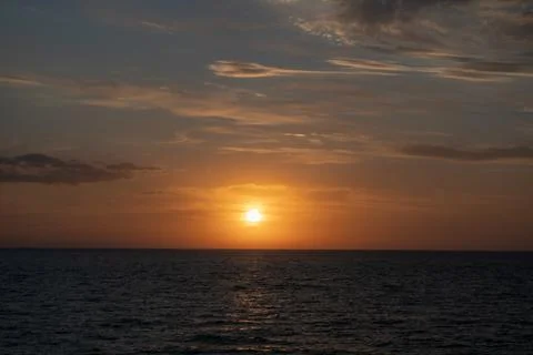 Sunset over the sea Stock Photos
