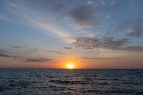Sunset over the sea Stock Photos