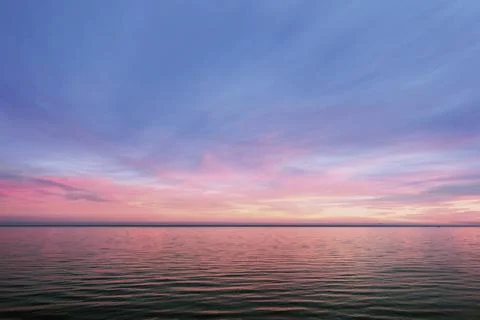 Sunset over the sea Stock Photos