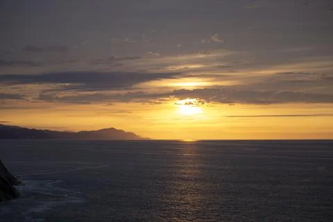 Sunset over the sea Stock Photos