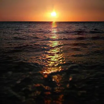 The sunset over the sea Stock Photos