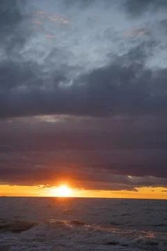 Sunset over the sea Stock Photos