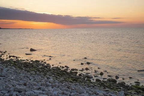 Sunset over the sea Stock Photos