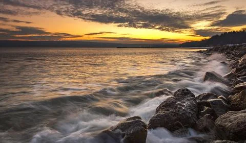 Sunset over the sea Stock Photos