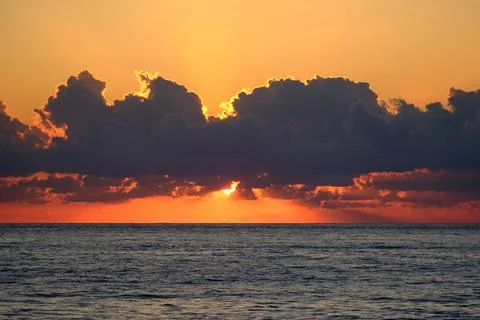 Sunset over the sea Stock Photos