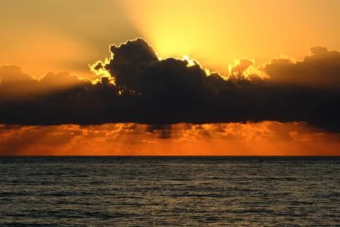 Sunset over the sea Stock Photos