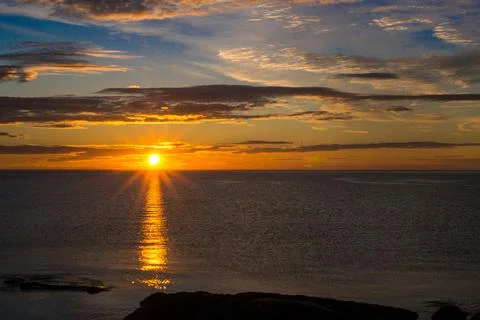 Sunset over the sea. Stock Photos