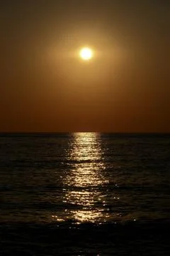Sunset over the sea. Stock Photos