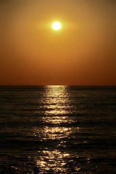 Sunset over the sea. Stock Photos
