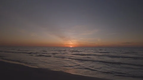 Sunset over the sea, on sandy beach FIX Stock Footage 120270063