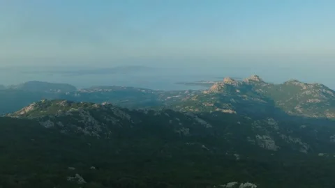 Sunset over the sea seen from a mountain Stock Footage 231810995