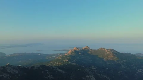 Sunset over the sea seen from a mountain Stock Footage 231812216