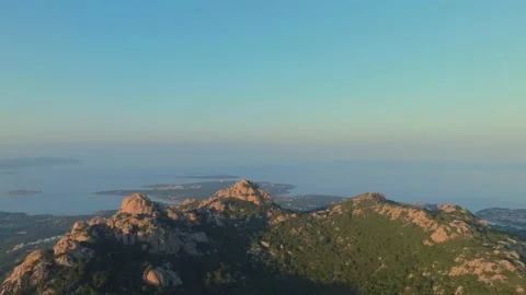 Sunset over the sea seen from a mountain Stock Footage 231813446