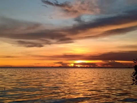 The sunset over the sea in spring makes the sky look beautiful. Chon Buri, Th Stock Photos