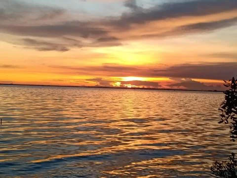 The sunset over the sea in spring makes the sky look beautiful. Chon Buri, Th Stock Photos
