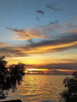 The sunset over the sea in spring makes the sky look beautiful. Chon Buri, Th Stock Photos