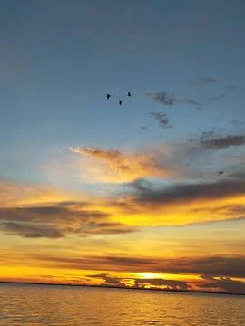 The sunset over the sea in spring makes the sky look beautiful. Chon Buri, Th Stock Photos
