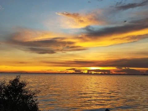 The sunset over the sea in spring makes the sky look beautiful. Chon Buri, Th Stock Photos