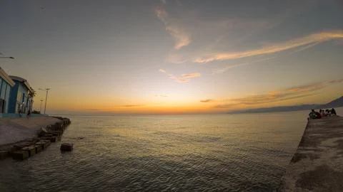 Sunset over the sea. The sun is reflected in the water. Stock-Fotos