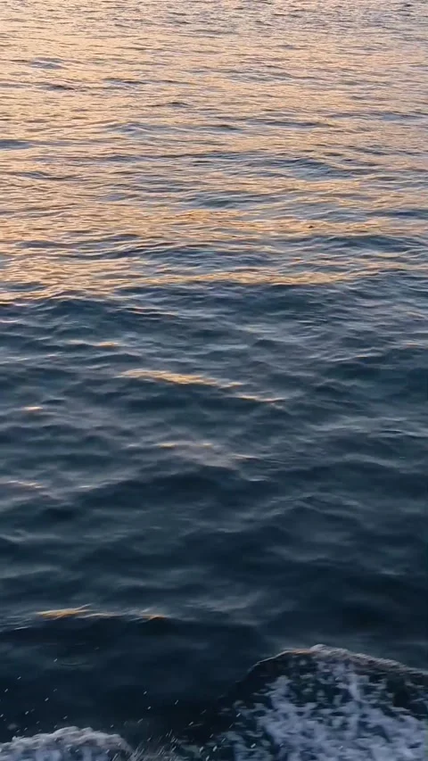 Sunset over the sea. The sun's glare on the sea waves Stock Footage 276944906