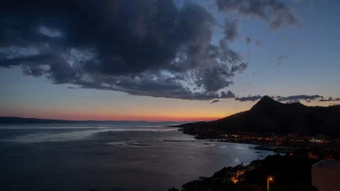 Sunset over the sea TIME LAPS Stock Footage 318072592