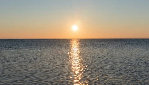 Sunset over the sea timelapse Stock Footage 124643343