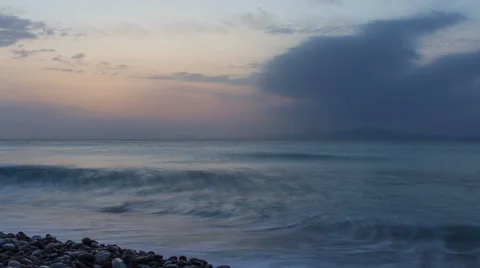 Sunset over the sea. Timelapse. Sailing ship on the horizon Video stock 64795464